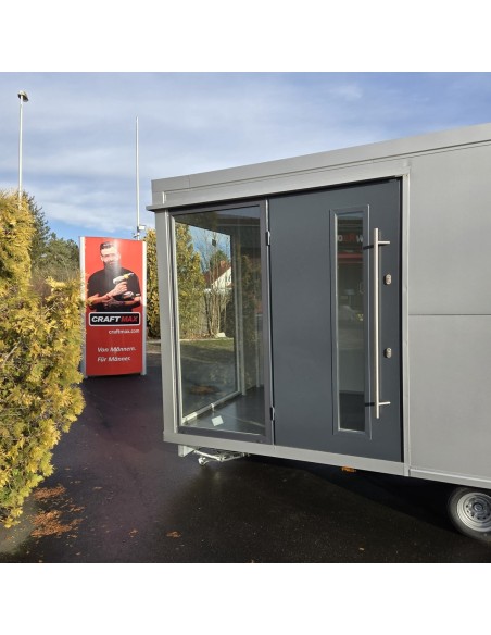 MobilOffice-2700-Thermo-Sandwichpanele-6.00-x-2.20-x-2.40m-grosse-Glasfenster-u.-Tuerelemente-Verkaufsklappe-1