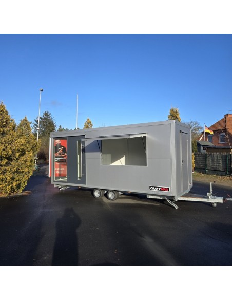 MobilOffice-2700-Thermo-Sandwichpanele-6.00-x-2.20-x-2.40m-grosse-Glasfenster-u.-Tuerelemente-Verkaufsklappe-11