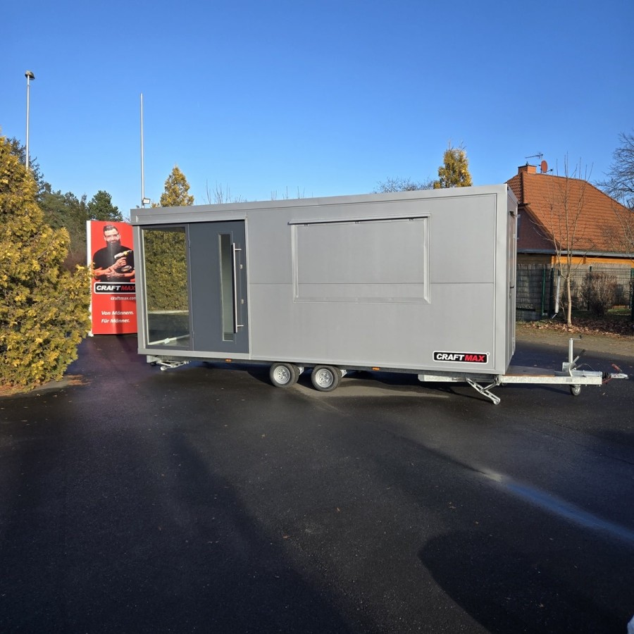MobilOffice-2700-Thermo-Sandwichpanele-6.00-x-2.20-x-2.40m-grosse-Glasfenster-u.-Tuerelemente-Verkaufsklappe-6