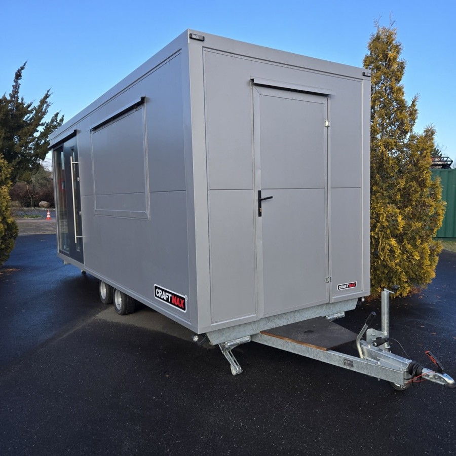 MobilOffice-2700-Thermo-Sandwichpanele-6.00-x-2.20-x-2.40m-grosse-Glasfenster-u.-Tuerelemente-Verkaufsklappe-4