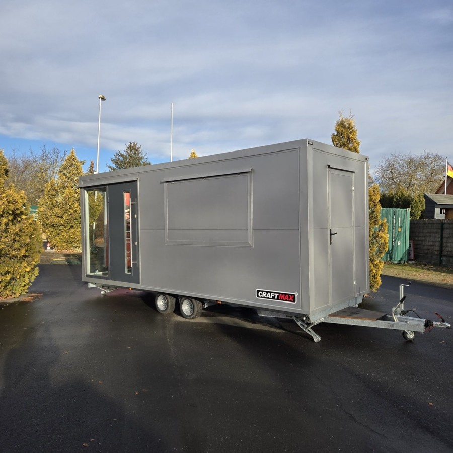 MobilOffice-2700-Thermo-Sandwichpanele-6.00-x-2.20-x-2.40m-grosse-Glasfenster-u.-Tuerelemente-Verkaufsklappe-8