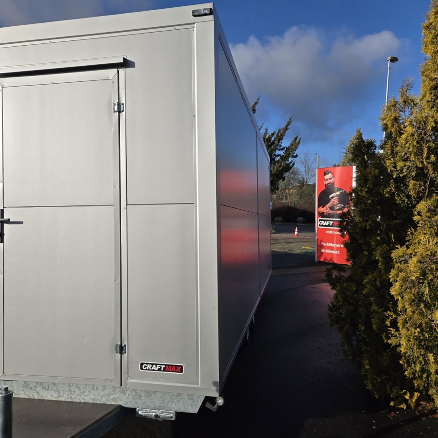 MobilOffice-2700-Thermo-Sandwichpanele-6.00-x-2.20-x-2.40m-grosse-Glasfenster-u.-Tuerelemente-Verkaufsklappe-13