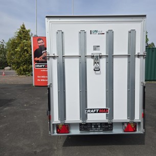 CRAFTMAX-750-Kofferanhaenger-mit-Rampe-2.55×1.42×1.53m-Unique-Sandwichpanele-ungebremst-100kmh-1 2